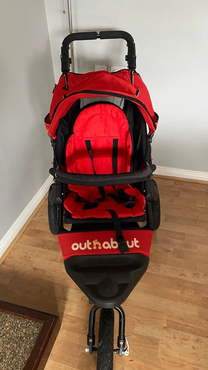 Out n about single with raincover and storage - Image 1