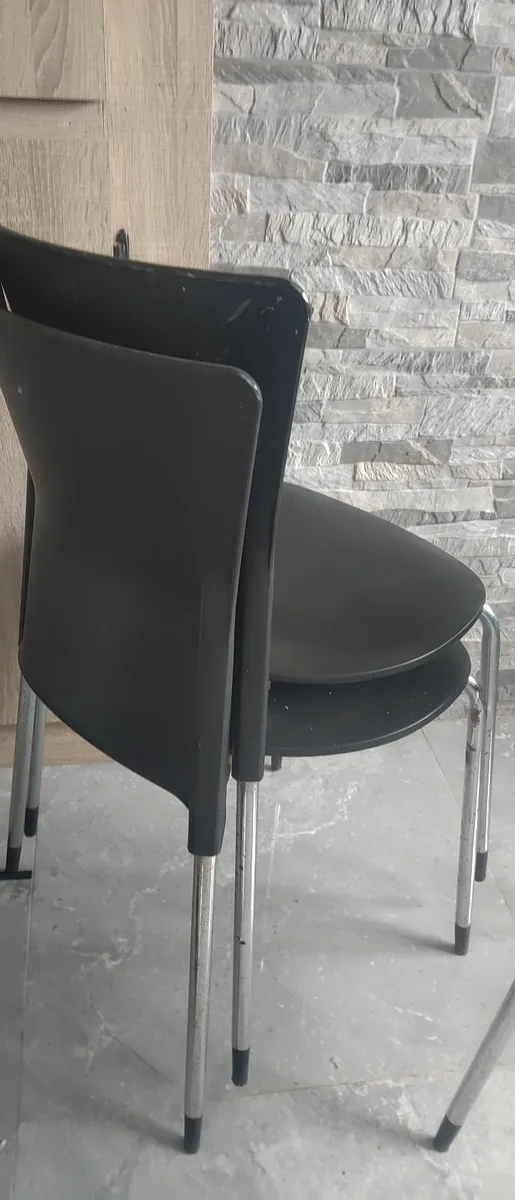 Black plastic chairs with silver legs . please rea - Image 3