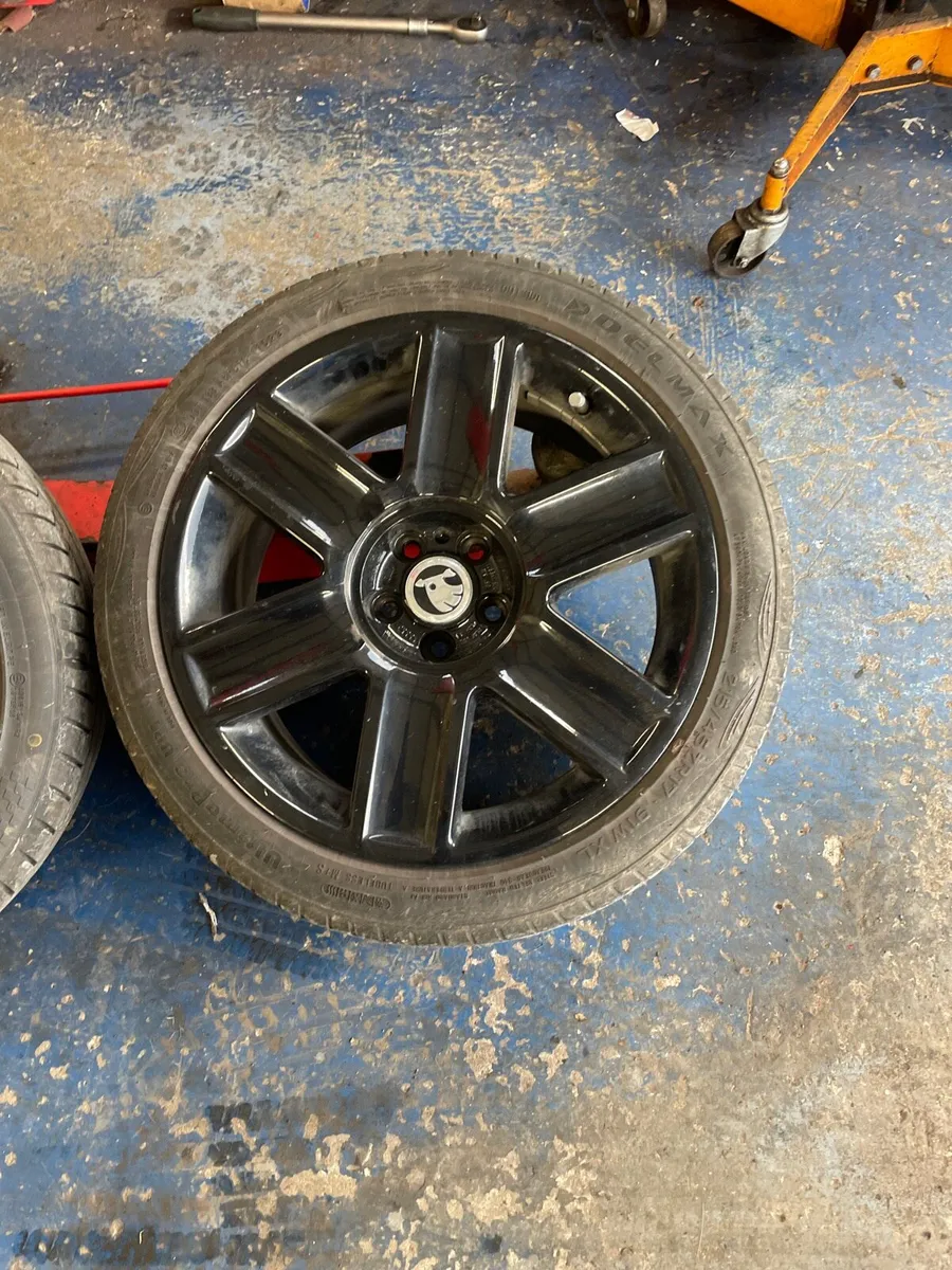 5x100 17” wheels and tires - Image 1