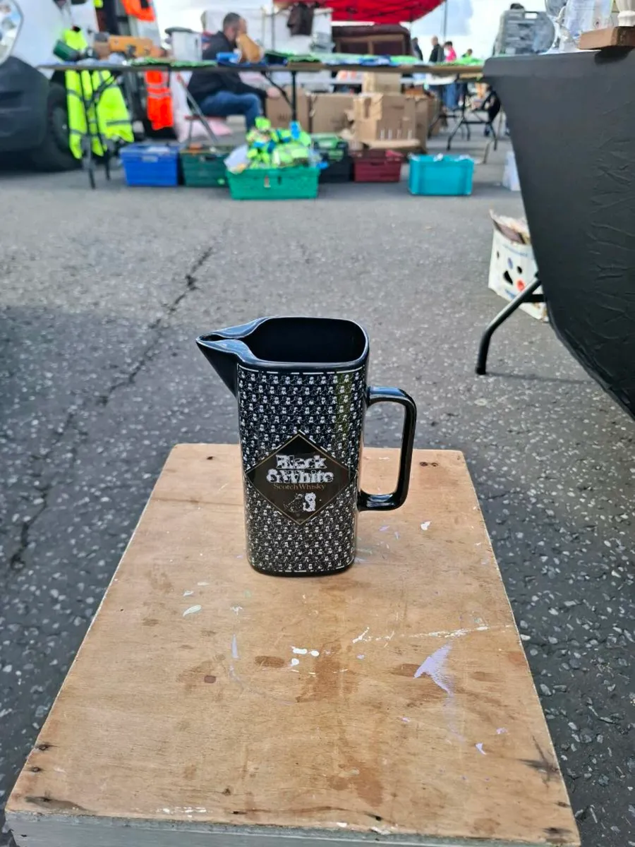 Black and white whiskey pitcher postage possible
