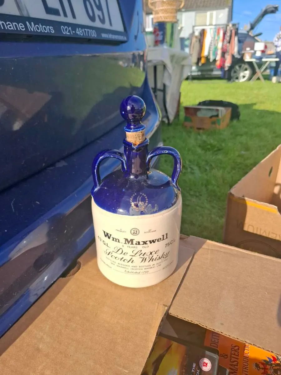 Whiskey collectible bottle postage possible