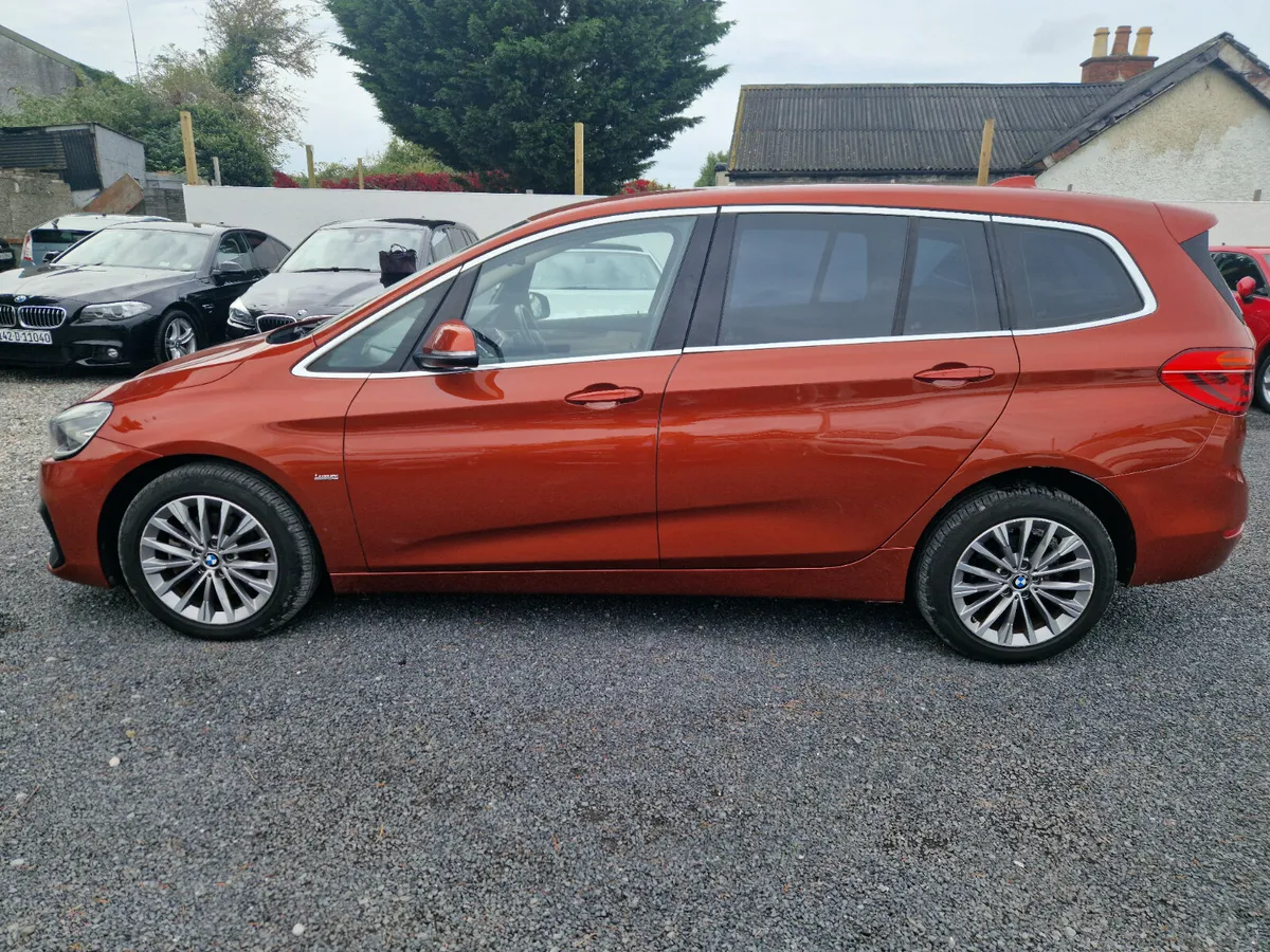 BMW 218D Gran Tourer 7 seater in Sunset Orange - Image 3