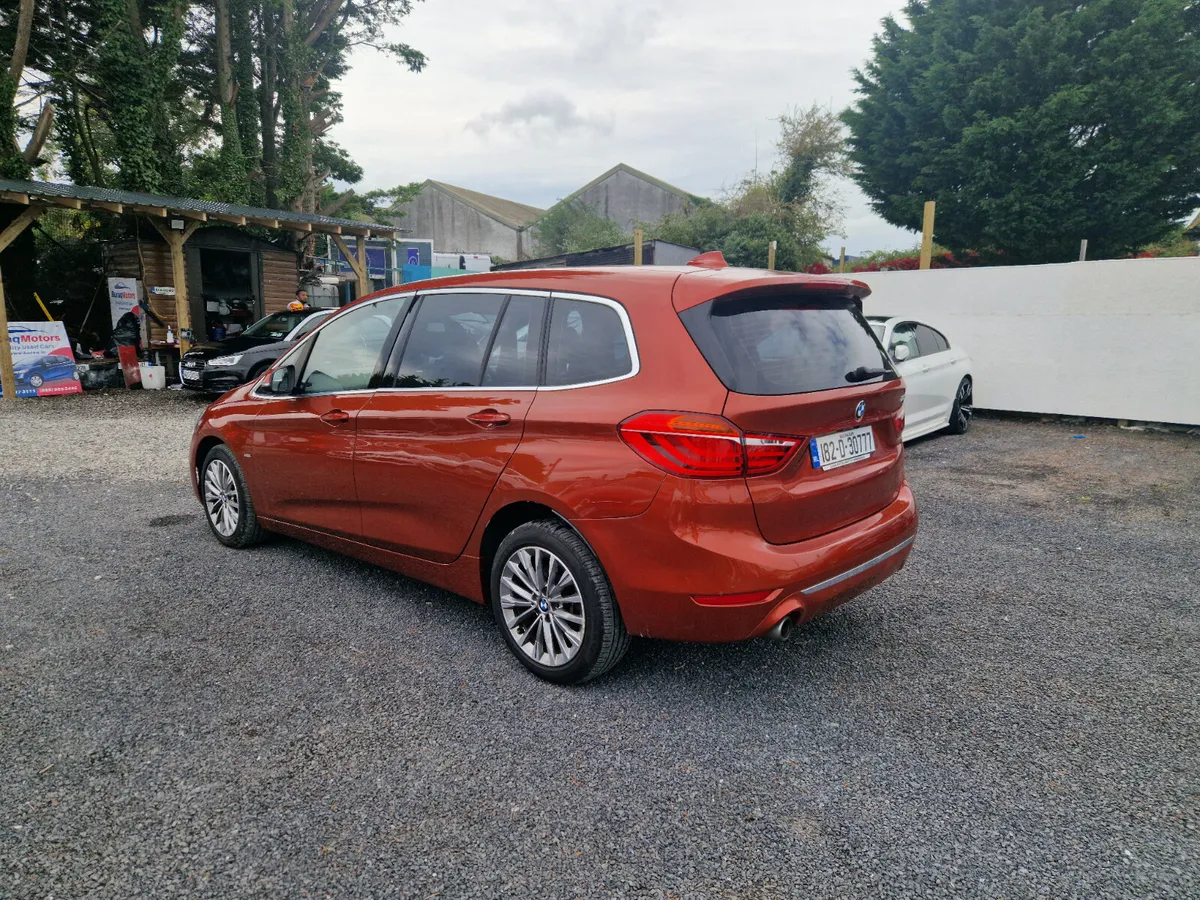 BMW 218D Gran Tourer 7 seater in Sunset Orange - Image 4