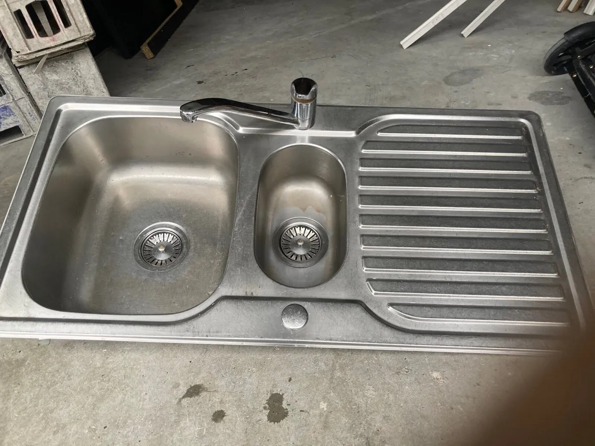 Kitchen sink and tap