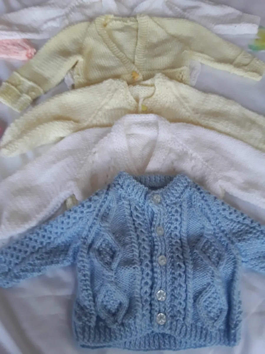Selection of hand knitted baby cardigans - Image 2