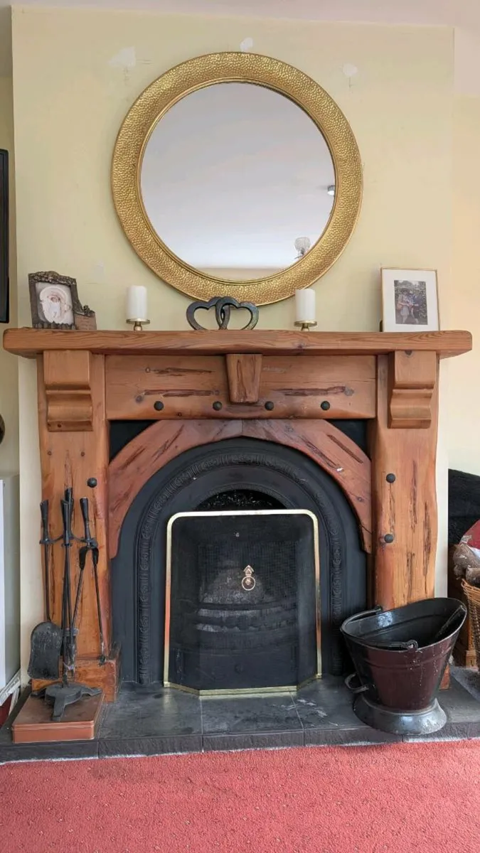 Fireplace with cast iron insert and slate hearth