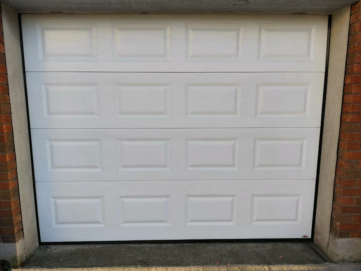 Insulated Garage door with motor