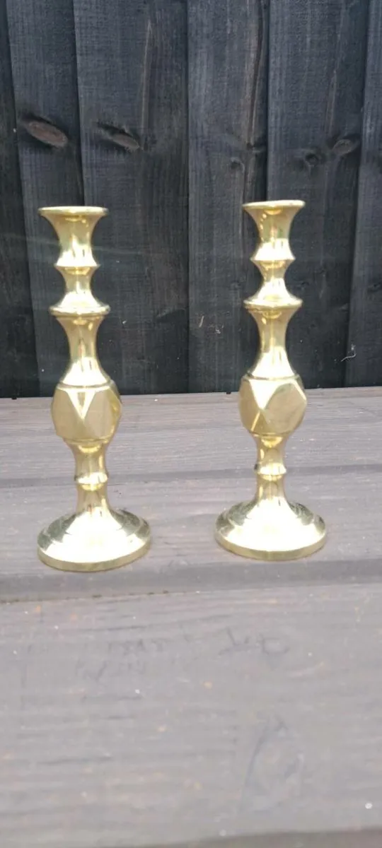 2 small  solid brass  candle stick holders - Image 1