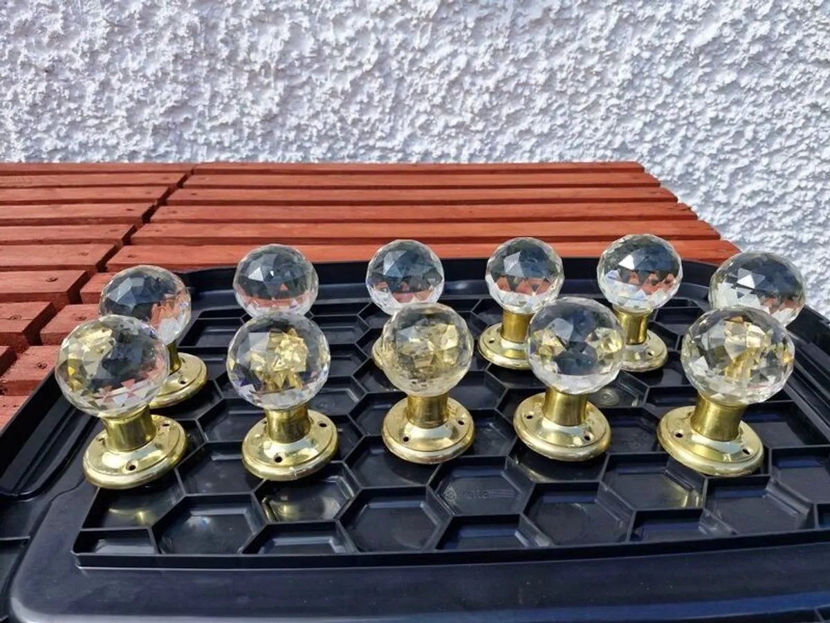 crystal glass door knobs brass and some silver - Image 1