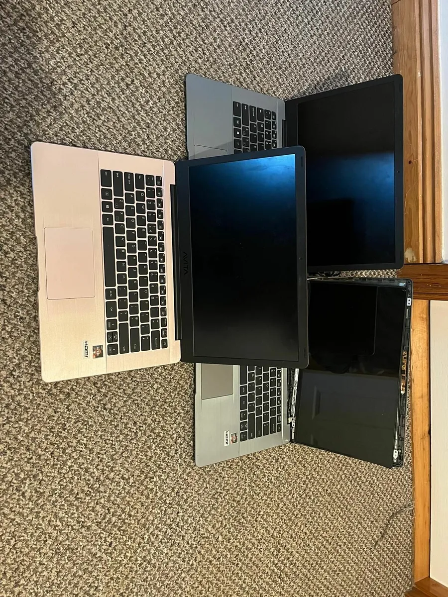 Lot of 3 identical Avita laptops plus one charger - Image 1