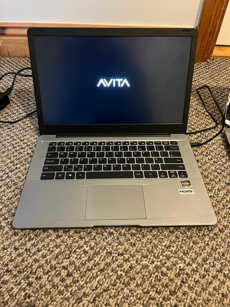 Lot of 3 identical Avita laptops plus one charger - Image 3