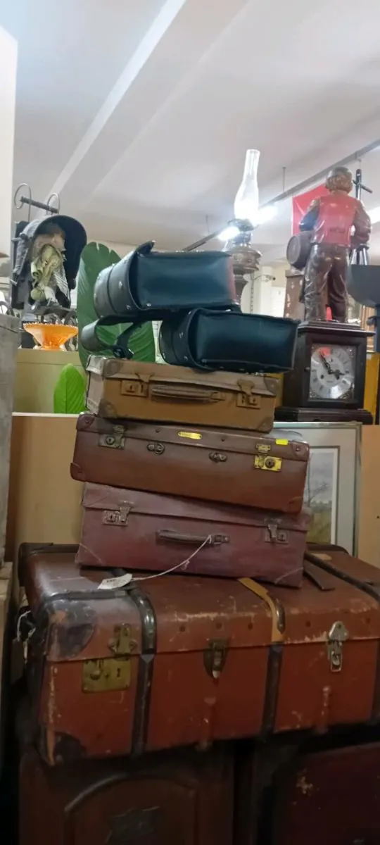 Selection Of Vintage Leather Suitcases And Trunks