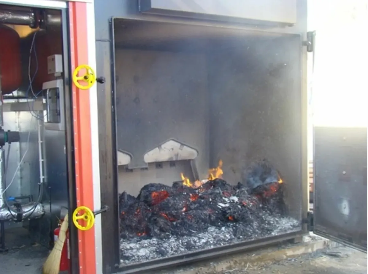 New Grant Straw Boiler burns cardboard and timber - Image 3
