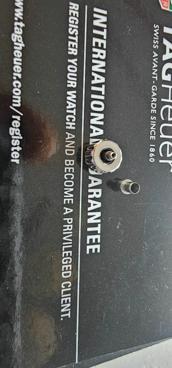 TAG Heuer original parts, warranty card, and paper - Image 3