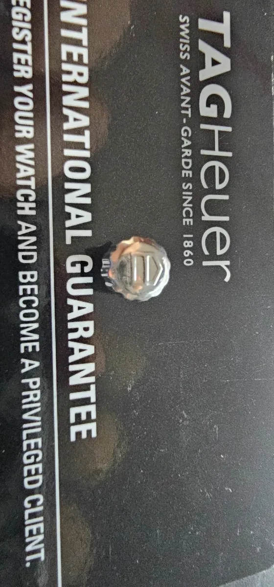 TAG Heuer original parts, warranty card, and paper - Image 4