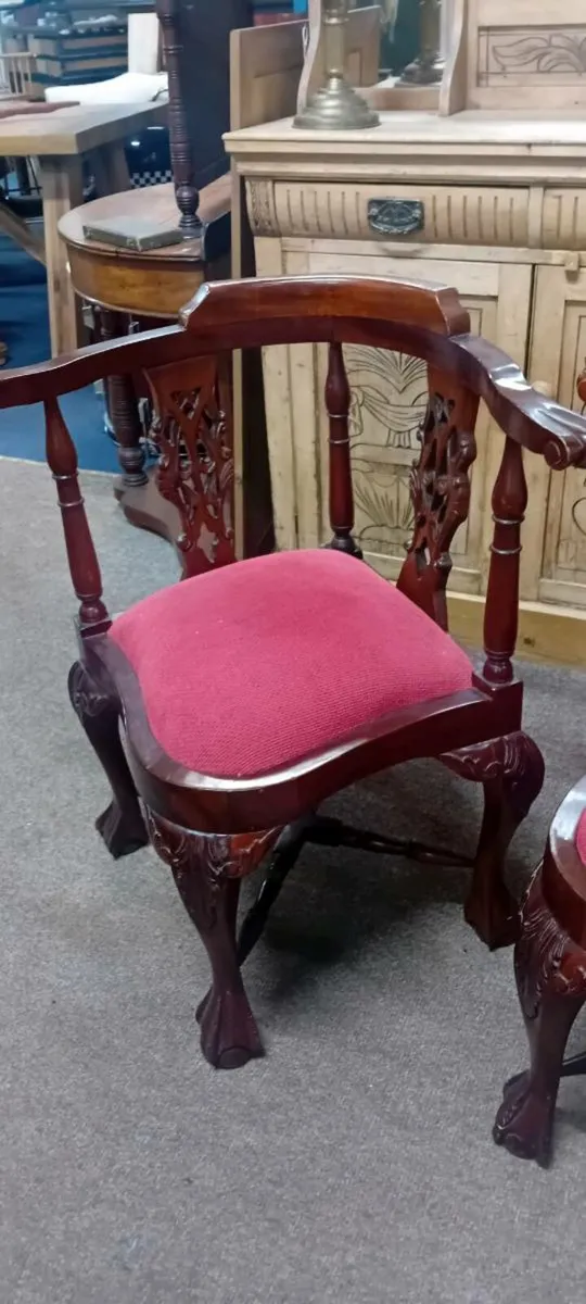 Carved Mahogany Corner Chairs