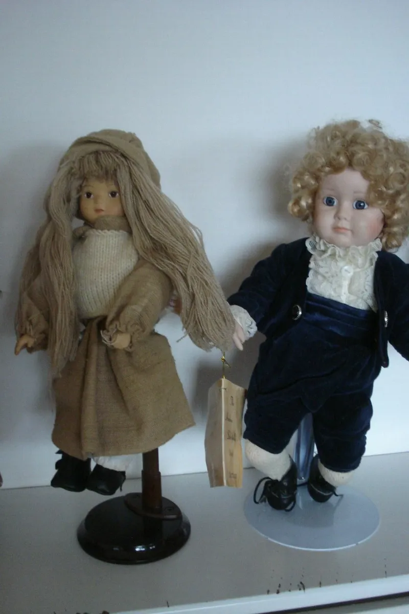 2 PORCELAIN DOLLS WITH HAND PAINTED FACES. - Image 1