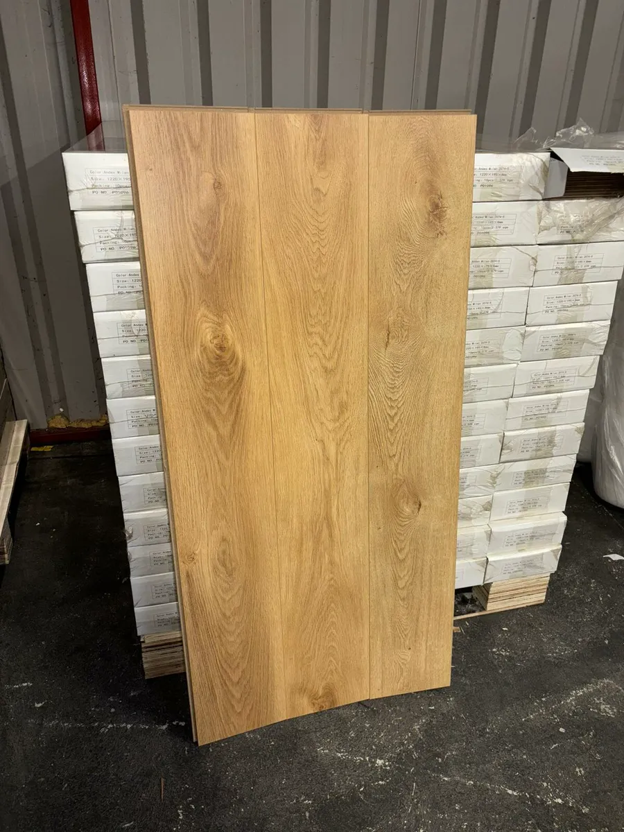 New 8MM FLOORING - Image 1