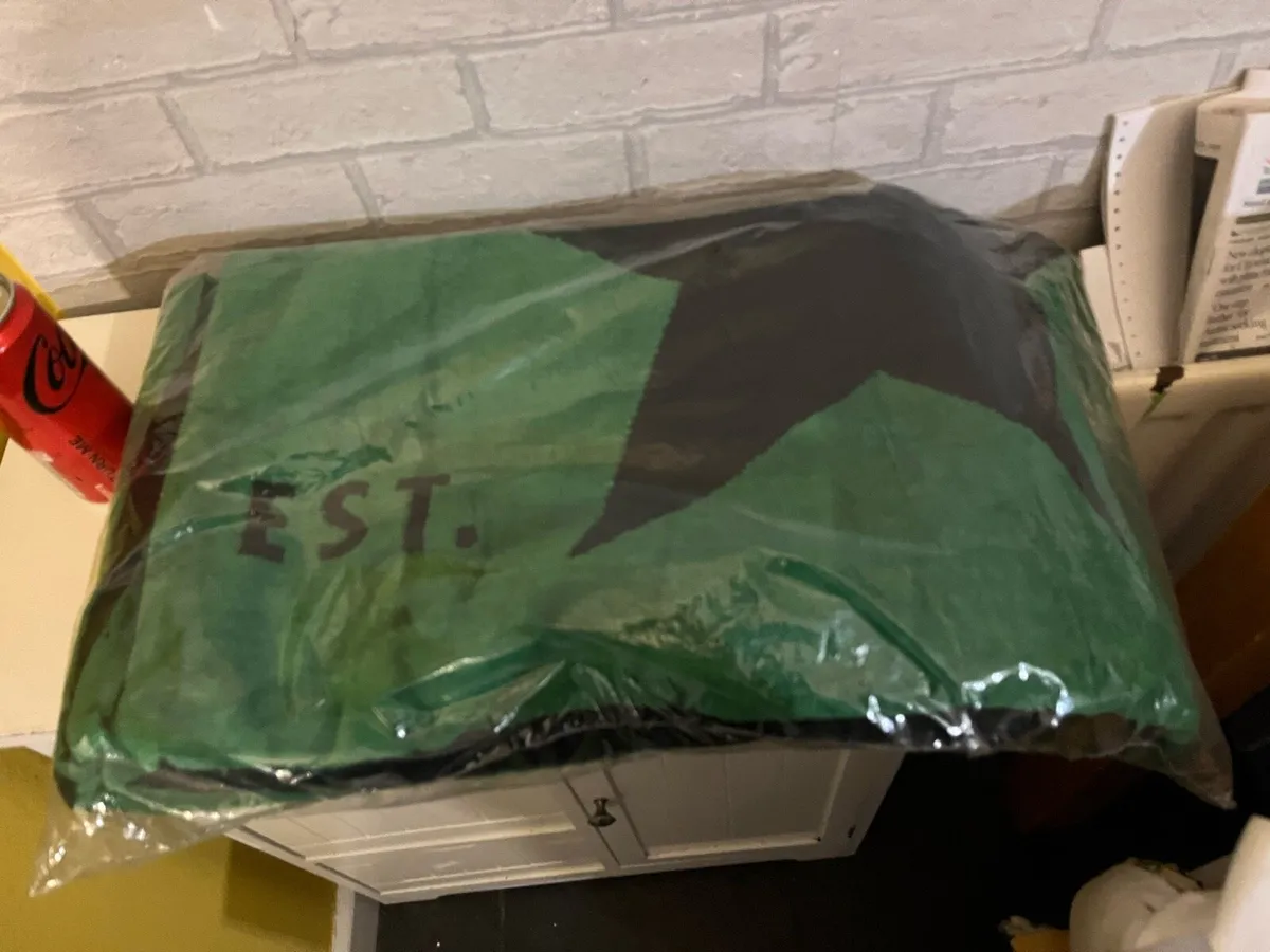 Large sealed Heineken towel