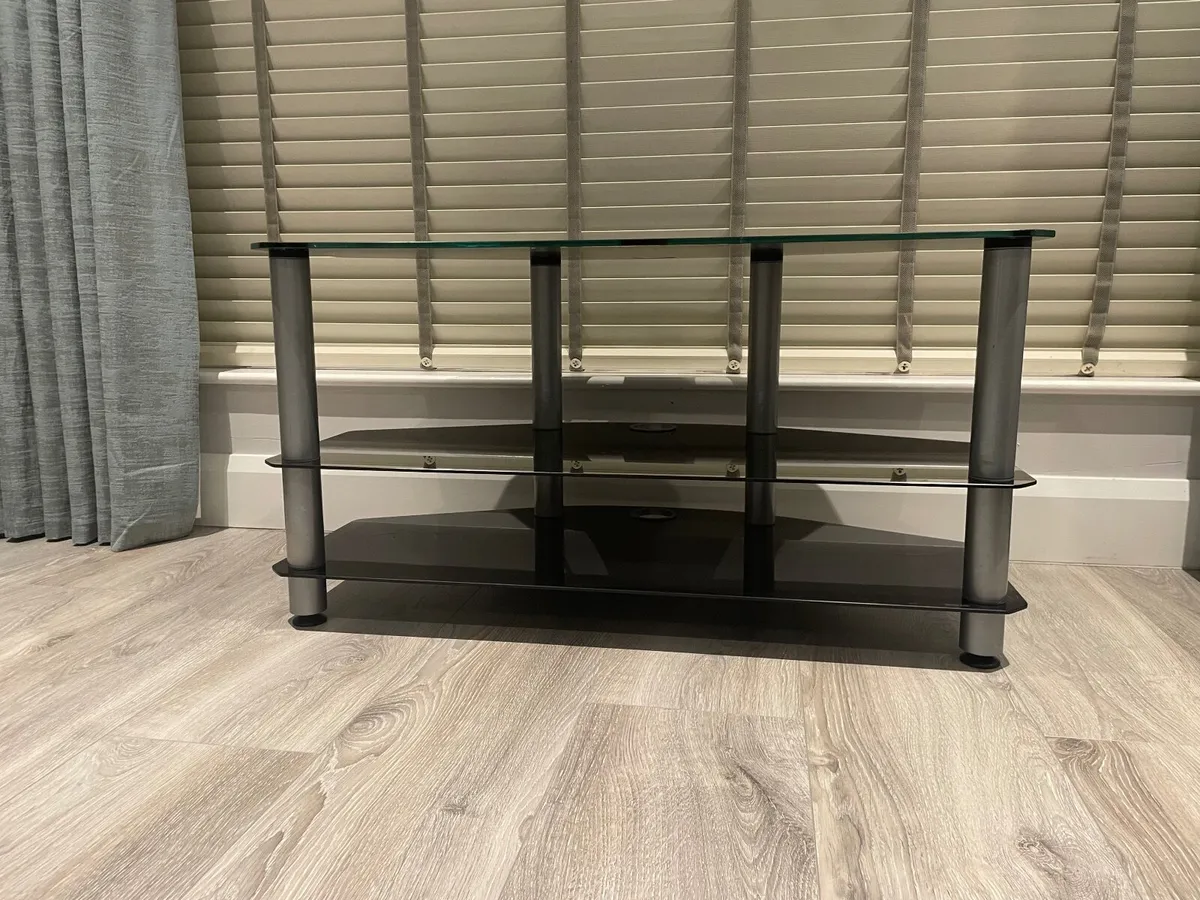 €75 ONO, Tv Stand Black Tempered Glass - Image 1