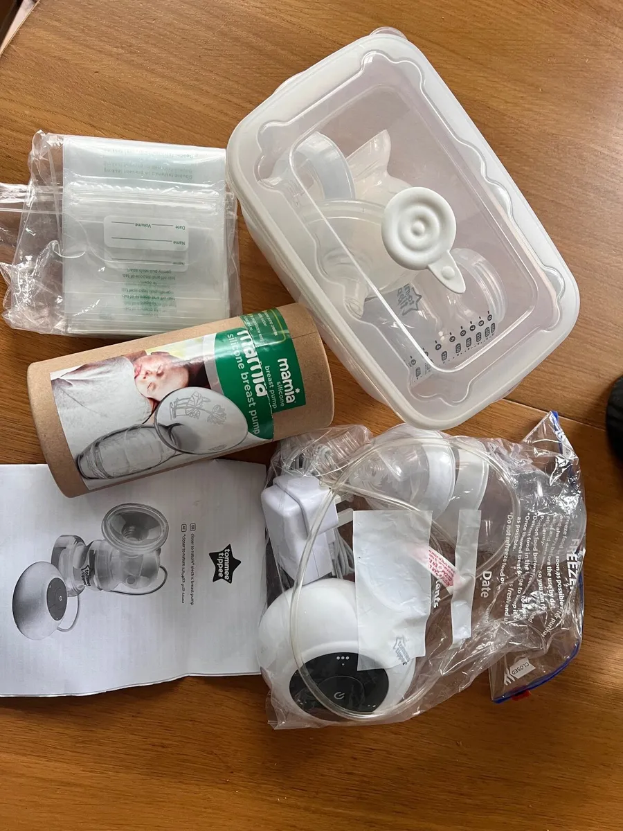 Breast pump and nursing accessories