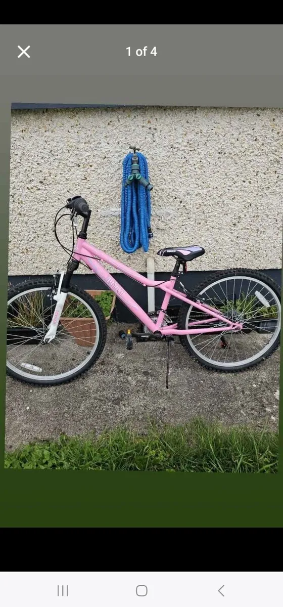 Girl pink bike  and exercise  bike