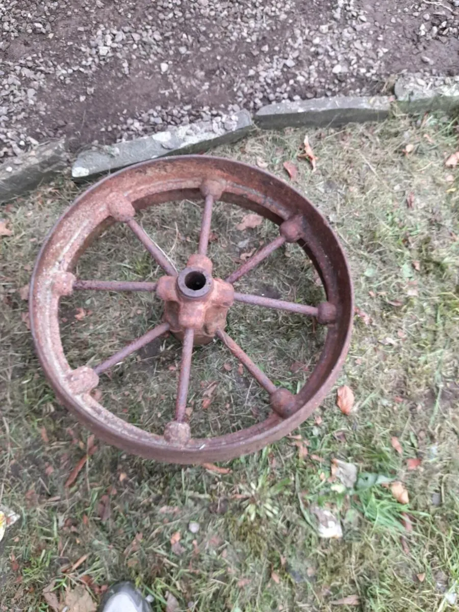 Two old iron wheels - Image 1