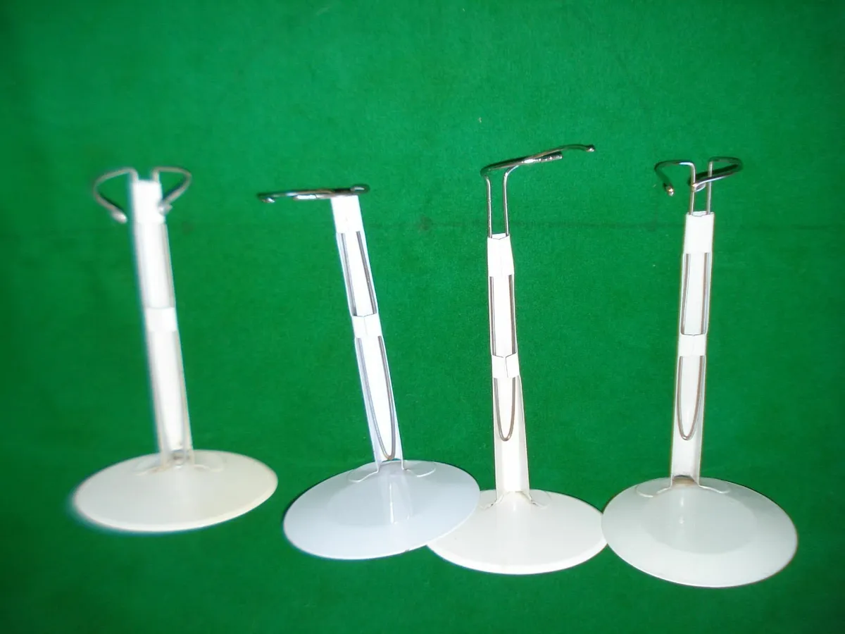 4  ADJUSTABLE WHITE  METAL DOLL STANDS. - Image 2