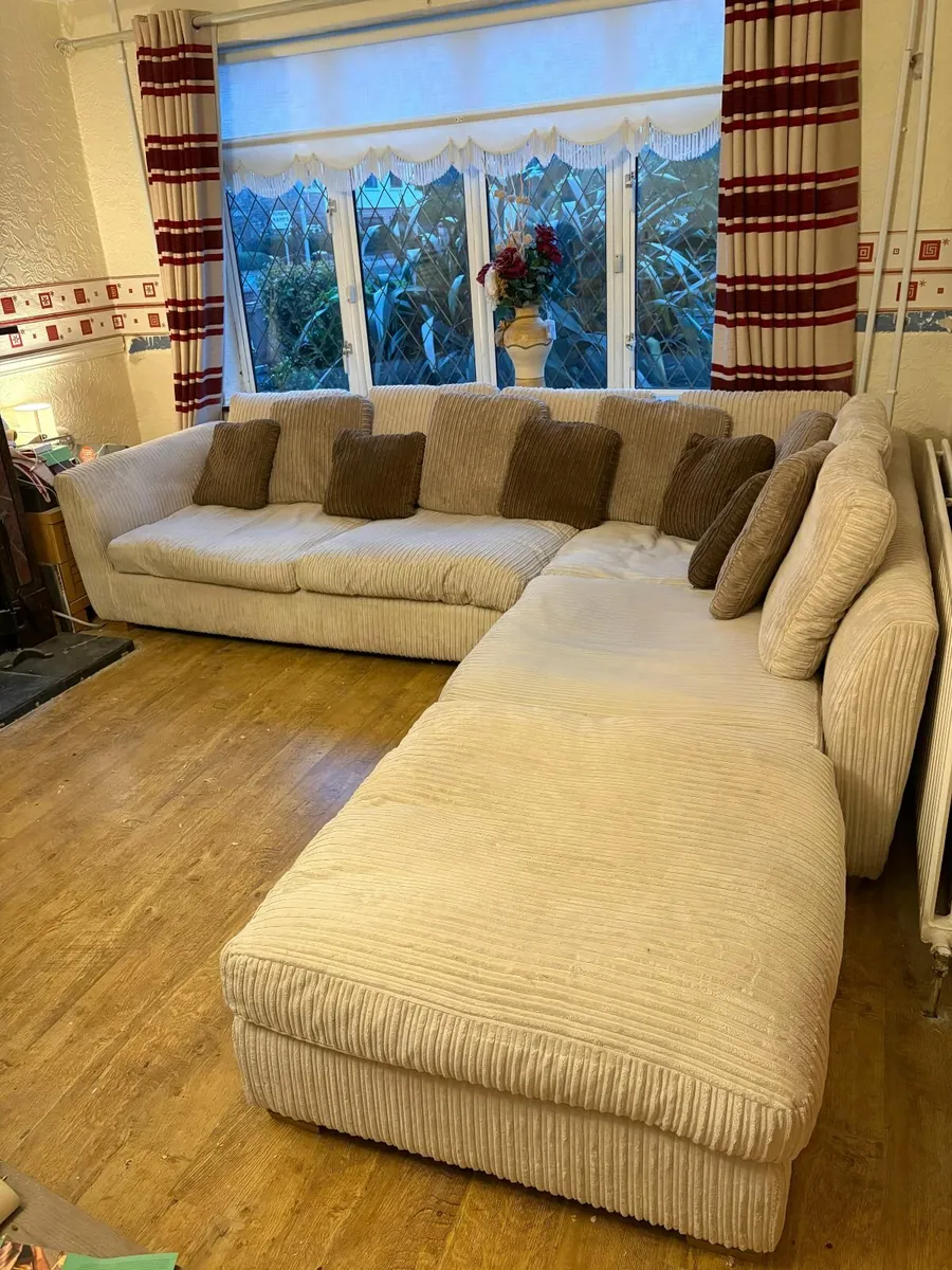 Large beige couch and ottoman with cushions - Image 3