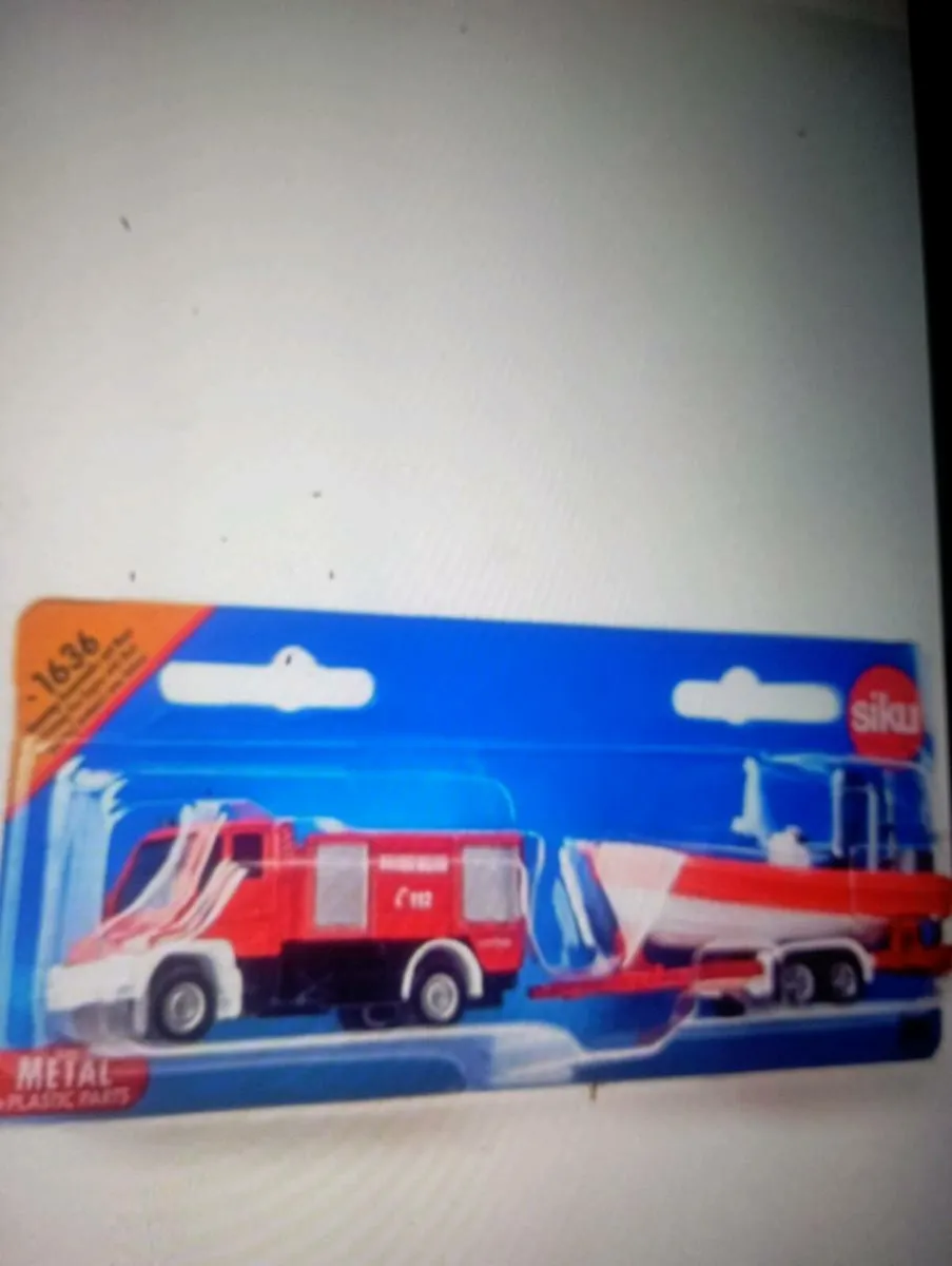SIKU  UNIMOG FIRE ENGINE &&BOAT 1-87 SCALE MODLE - Image 1