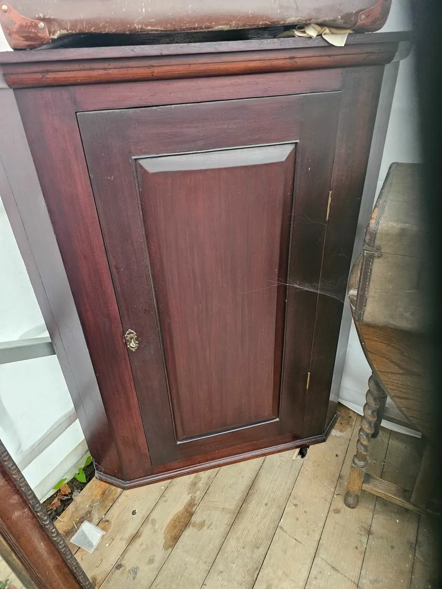 Antique mahogany corner cabinet