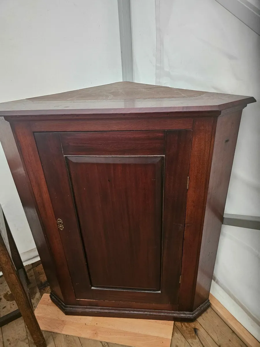 Antique mahogany corner cabinet