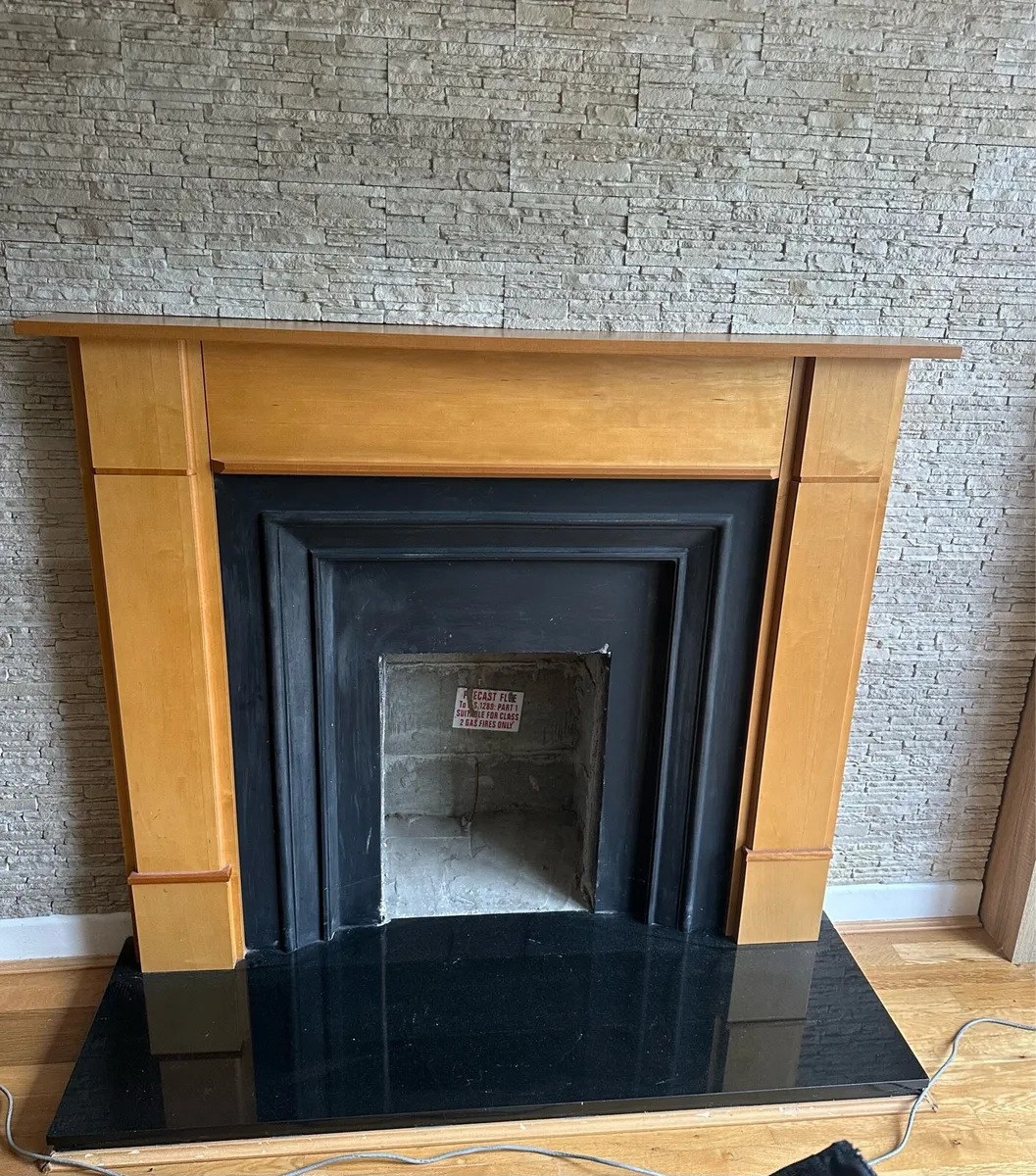 Fireplace surround and stove - Image 1