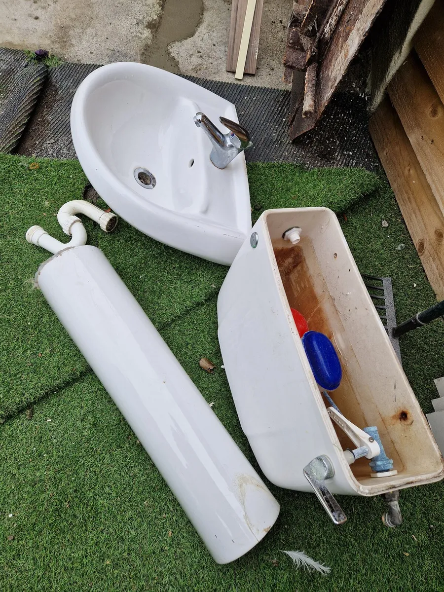 Sink, cistern and pedestal.