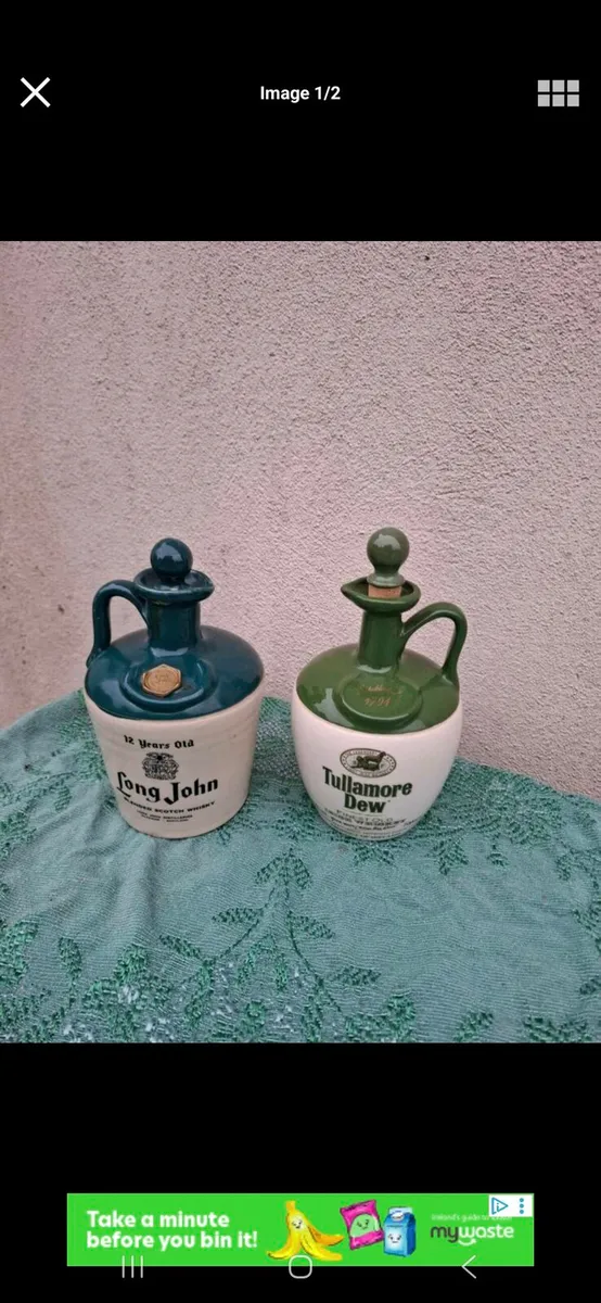 2 decoratives whiskey bottles possible to post