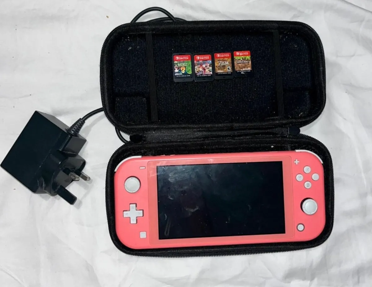 Nintendo switch lite with 9 games & micro SD card - Image 1