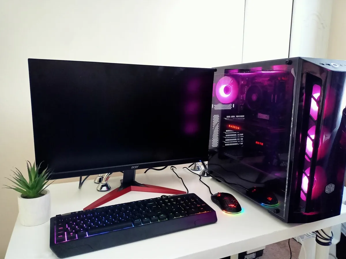 Powerful gaming PC setup with monitor and keyboard - Image 3