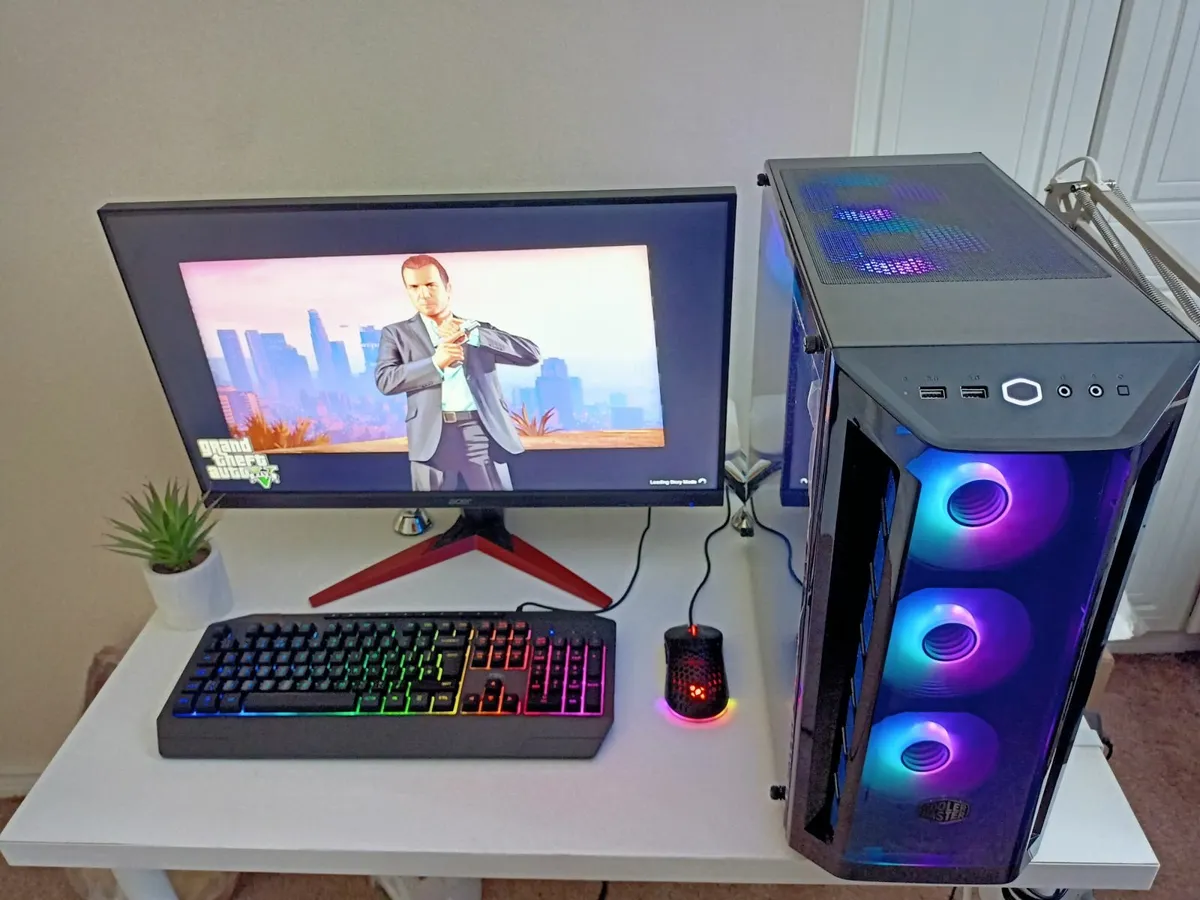 Powerful gaming PC setup with monitor and keyboard - Image 2