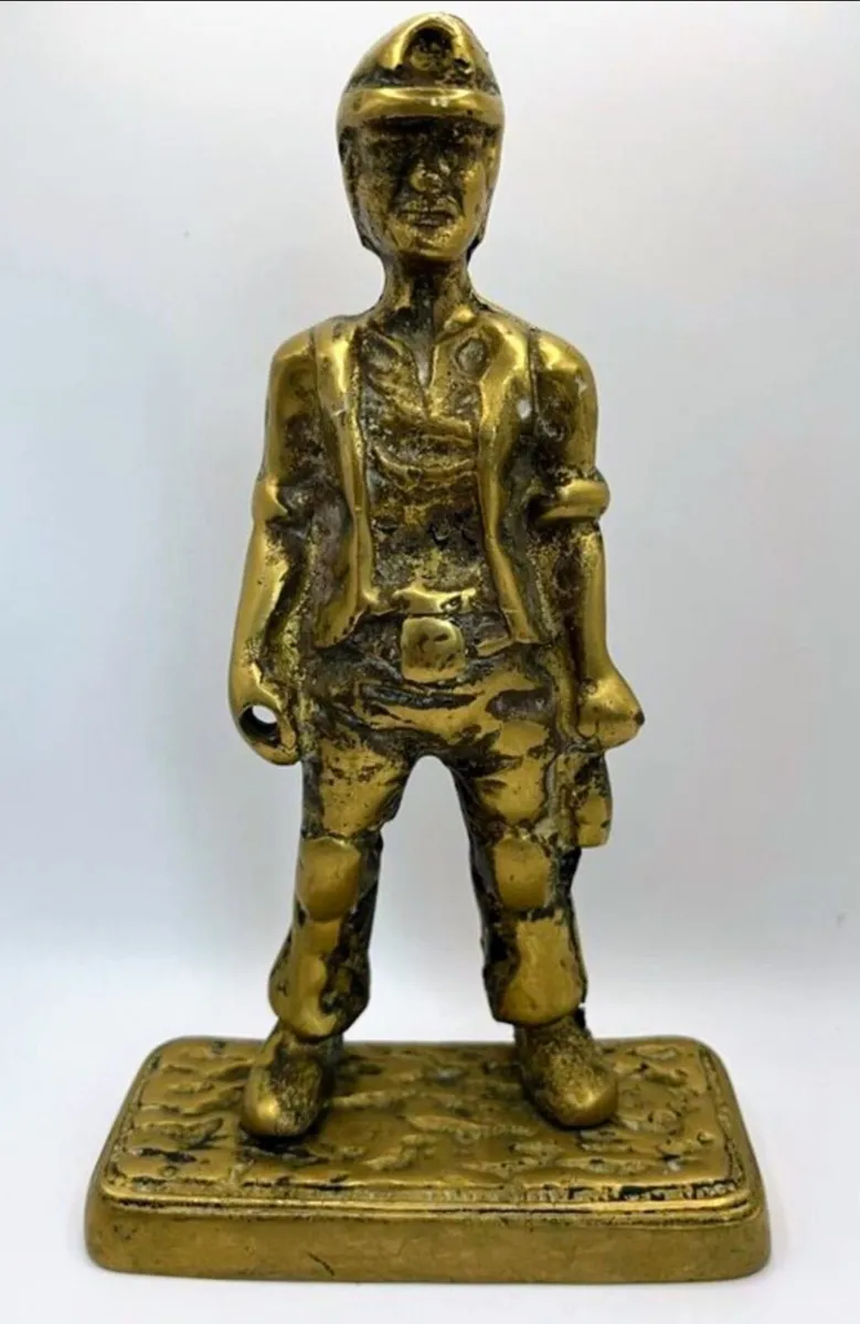 Solid brass figurine