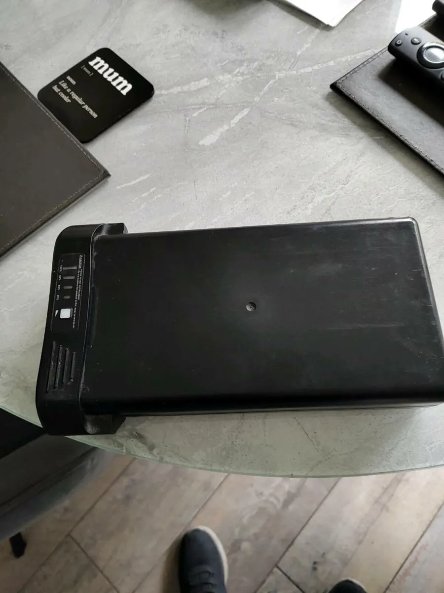 Battery and charger - Image 1
