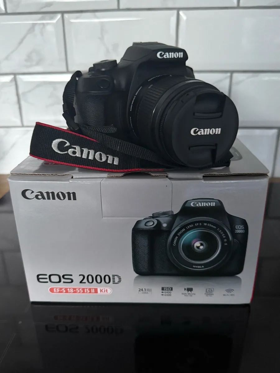 Canon EOS 2000D with Zoom Lens and Accessories - Image 1