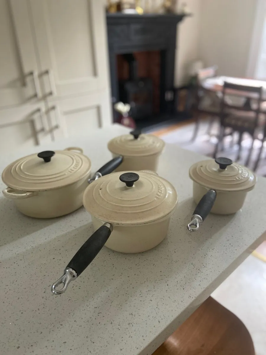 Le Creuset Cream Cast Iron Cookware Set of 4 - Image 1