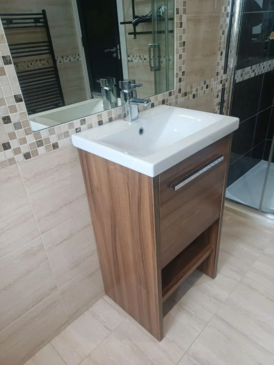 Bathroom sink and taps with cabinet - Image 4