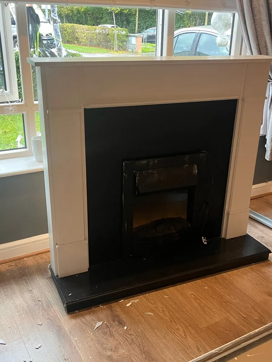 Electric fire and wooden surround - Image 1