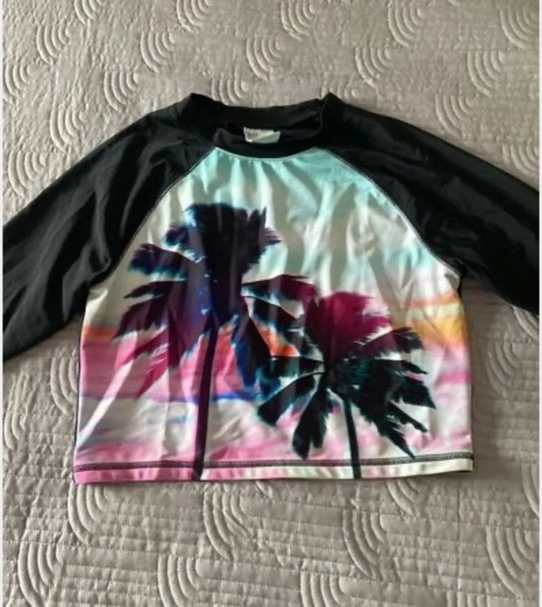 H&M Sun Protector Wet Top - Image 1