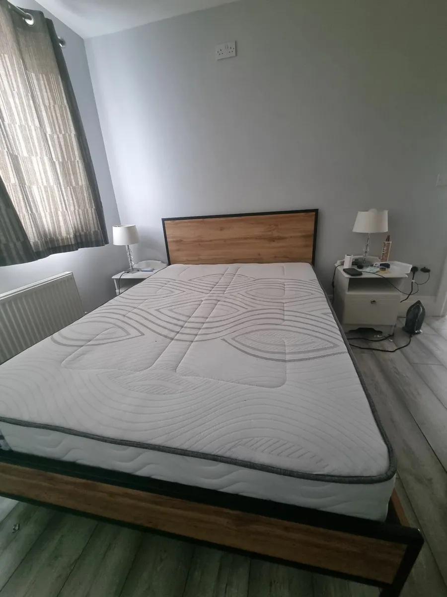 A double bed with base €300