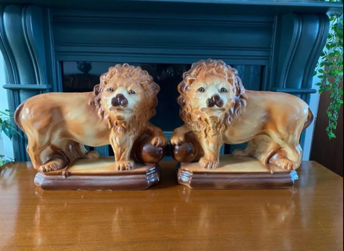 Antique Pottery Lions - Image 1