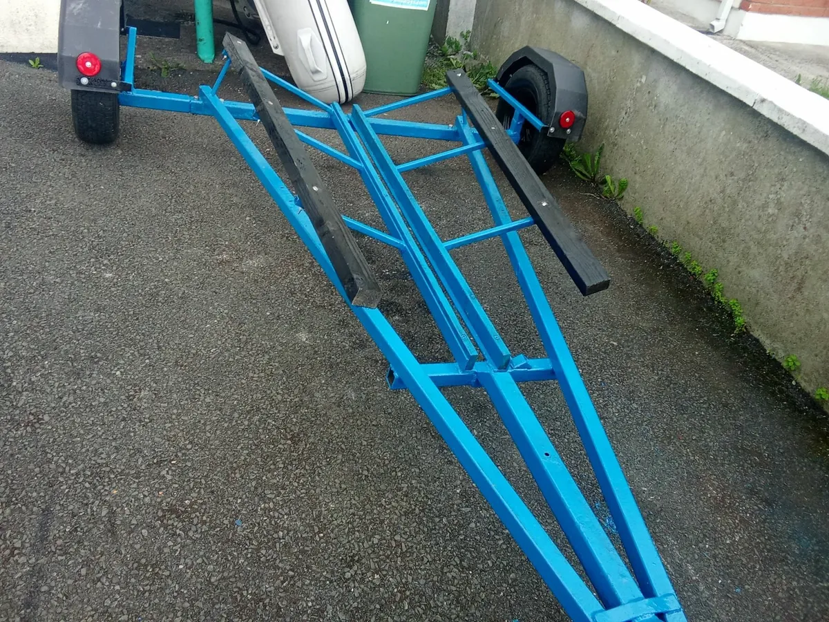 Boat trailer and life jackets. - Image 2