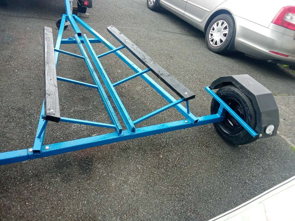 Boat trailer and life jackets. - Image 4