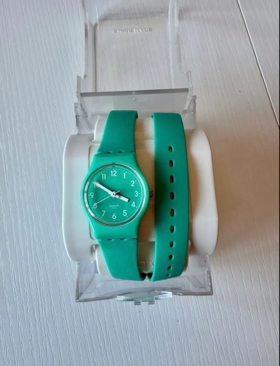 Swatch unisex watch, mint colour, like new